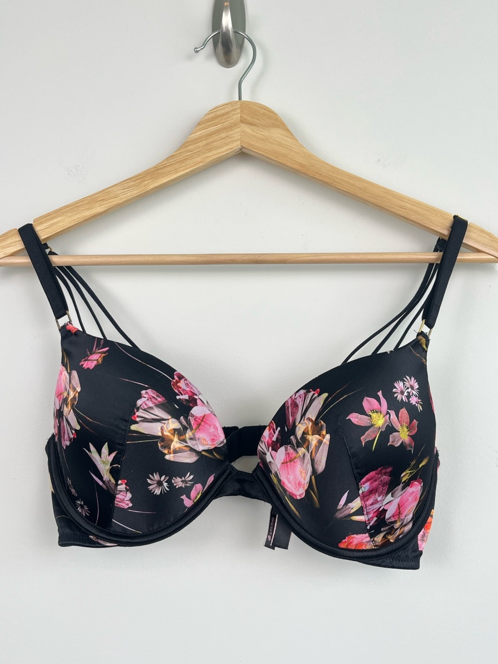 Victoria’s Secret black floral Very Sexy Push-Up strappy back bra, 34C.